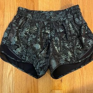 Hotty Hot Low Rise 4 inch Metallic Iridescent Floral Shorts